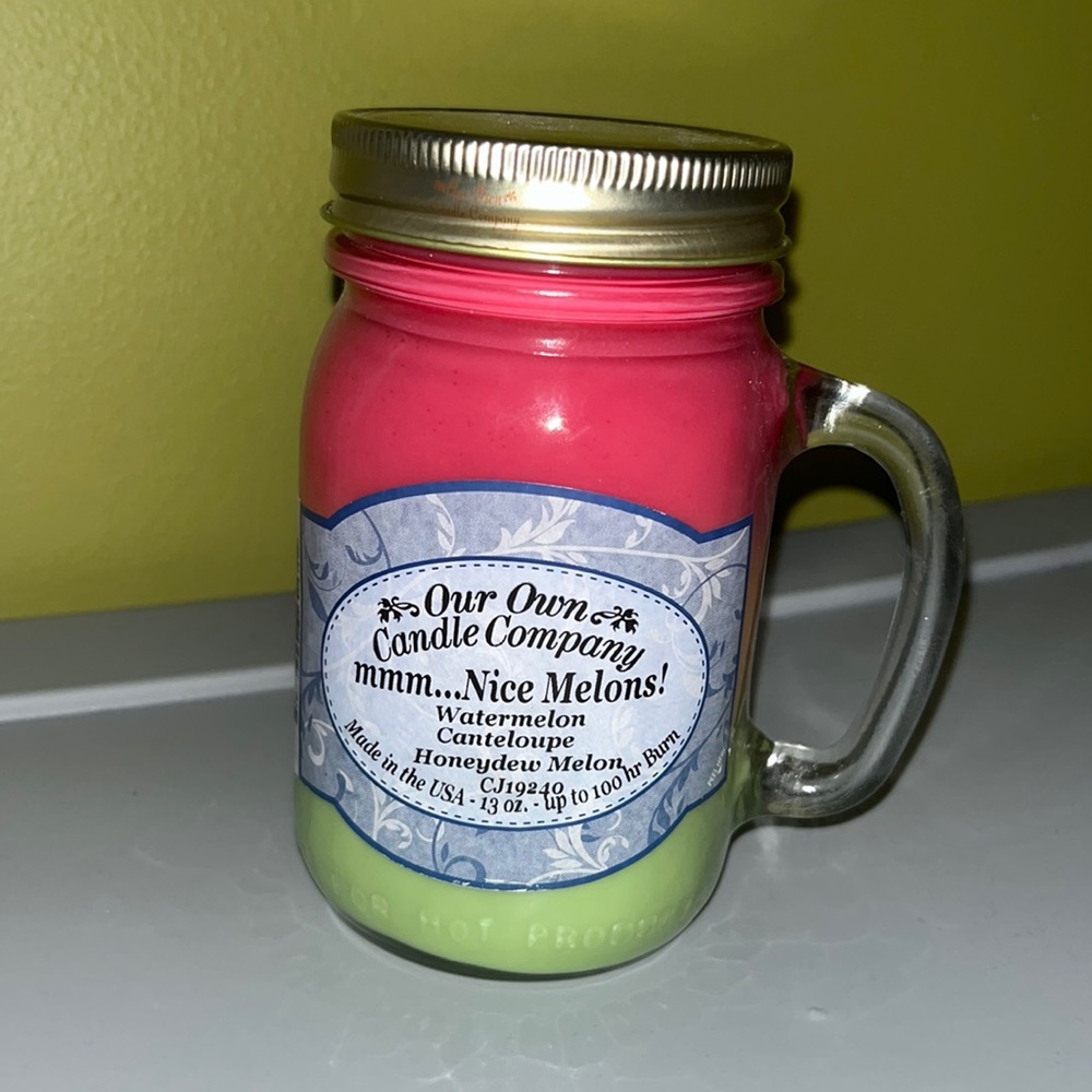 NWT Multi Colored Melon Scented Candle !!